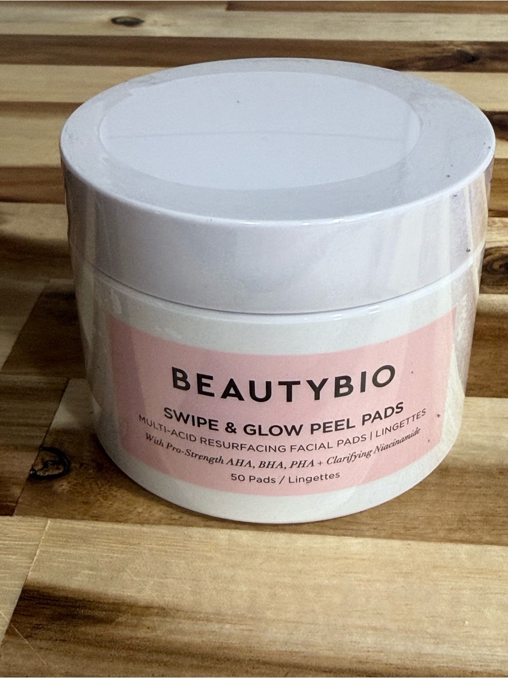 BeautyBio Swipe & Glow Peel Pads — White and Pink Jar